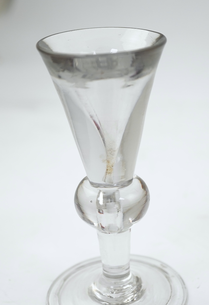 A heavy baluster toastmaster's glass, circa 1715-1720